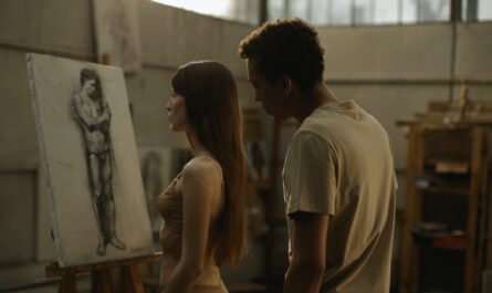 man and woman checking the painting